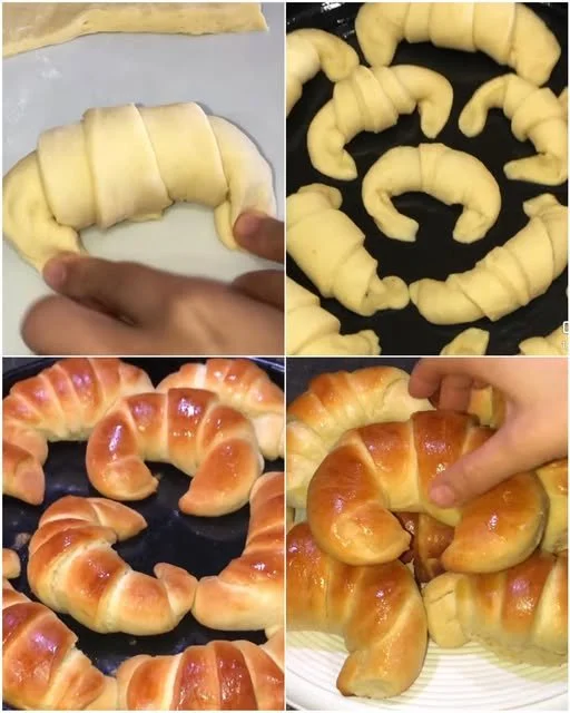 Medialunas esponjosas recién horneadas en una bandeja